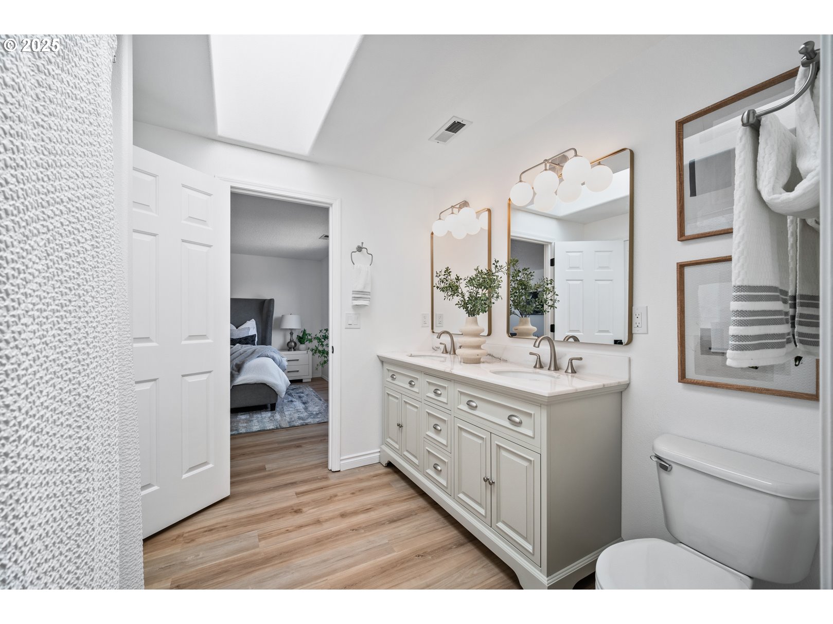 2952 Northwest Ogden Street Camas, WA 98607 - Photo 19 of 31 a bathroom with a sink a toilet and a mirror