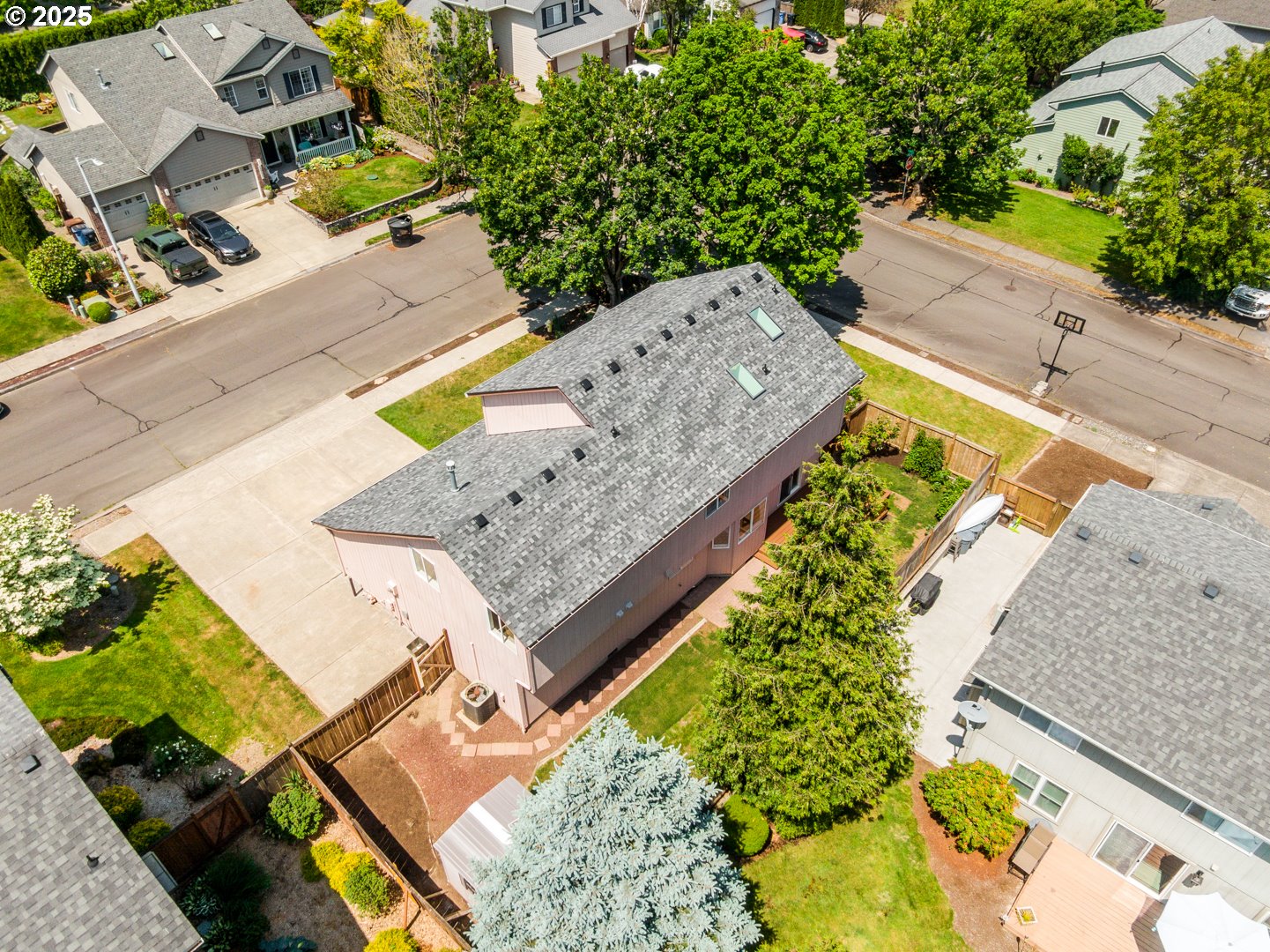 2952 Northwest Ogden Street Camas, WA 98607 - Photo 30 of 31 an aerial view of a house with a garden and swimming pool