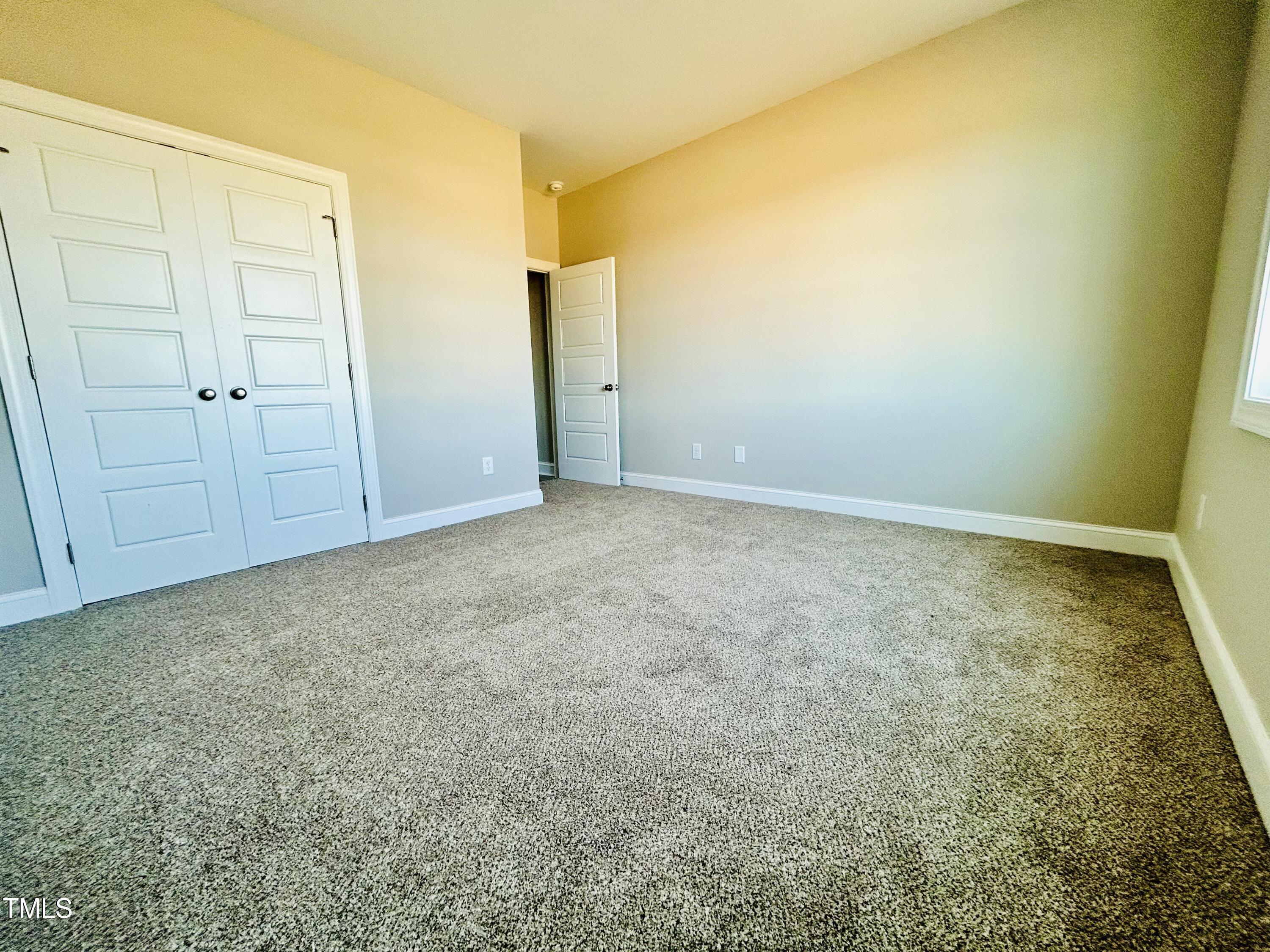 9787 Pace Road Bailey, NC 27807 - Photo 13 of 18 an empty room with a natural light