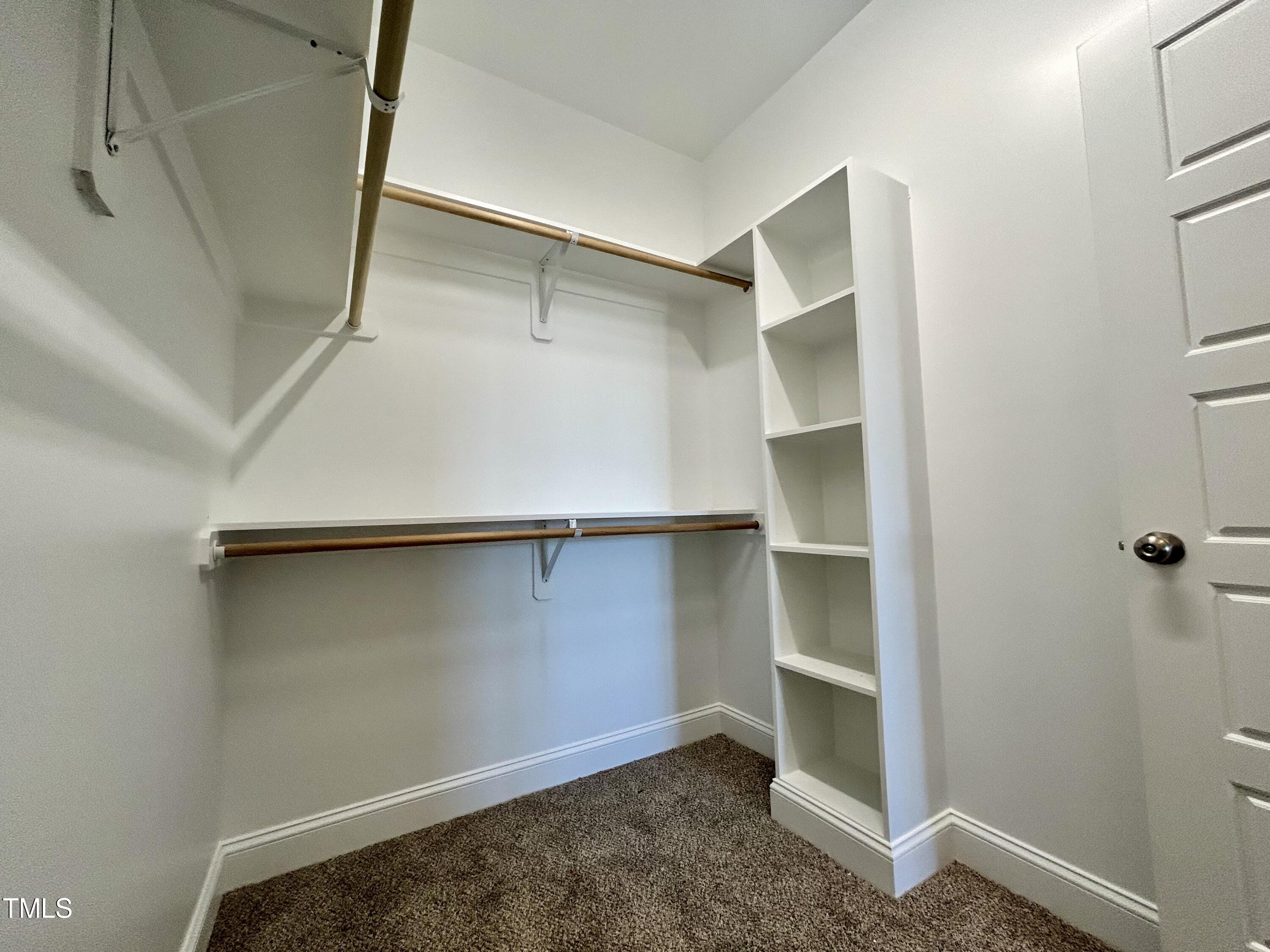 9787 Pace Road Bailey, NC 27807 - Photo 10 of 18 a view of an empty walk in closet