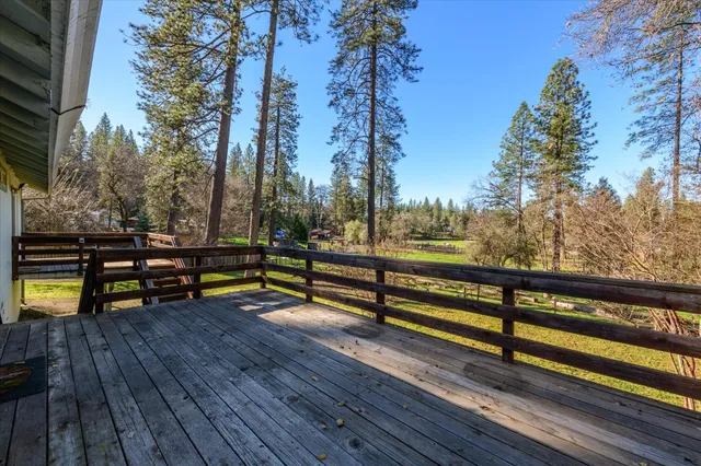a view of outdoor space with wooden deck