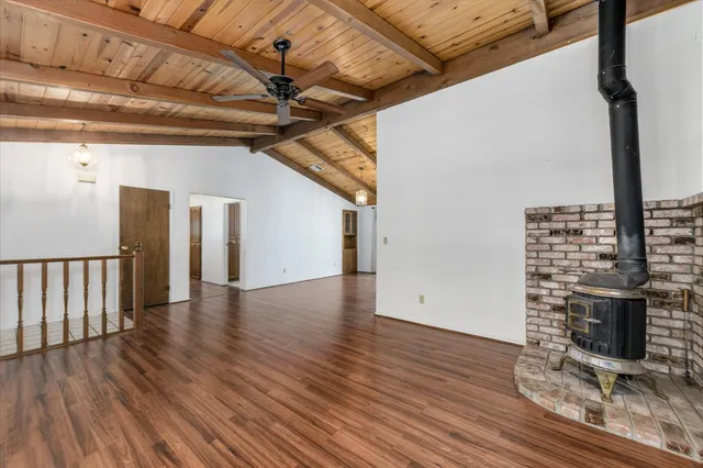 a view of outdoor space with wooden floor and seating space