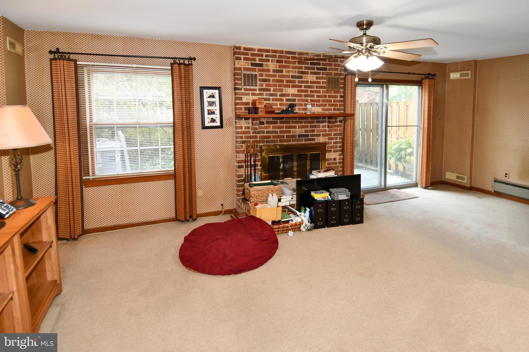 61 Oak Shade Road Gaithersburg, MD 20878 - Photo 24 of 42 an outdoor room with windows