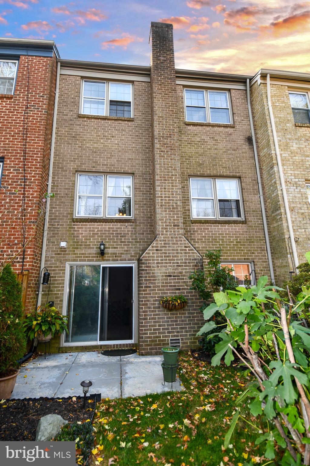 61 Oak Shade Road Gaithersburg, MD 20878 - Photo 28 of 42 a front view of a house with a yard