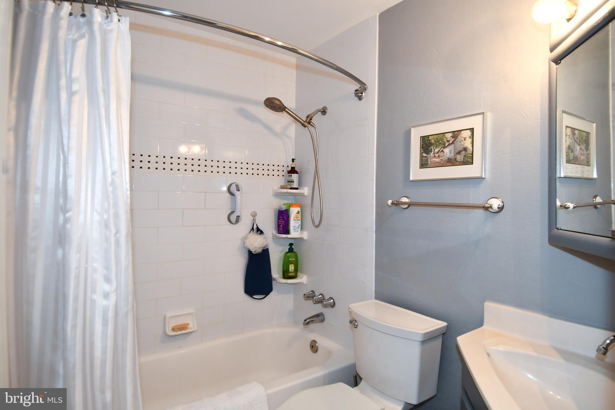 61 Oak Shade Road Gaithersburg, MD 20878 - Photo 33 of 42 a bathroom with a toilet and a shower