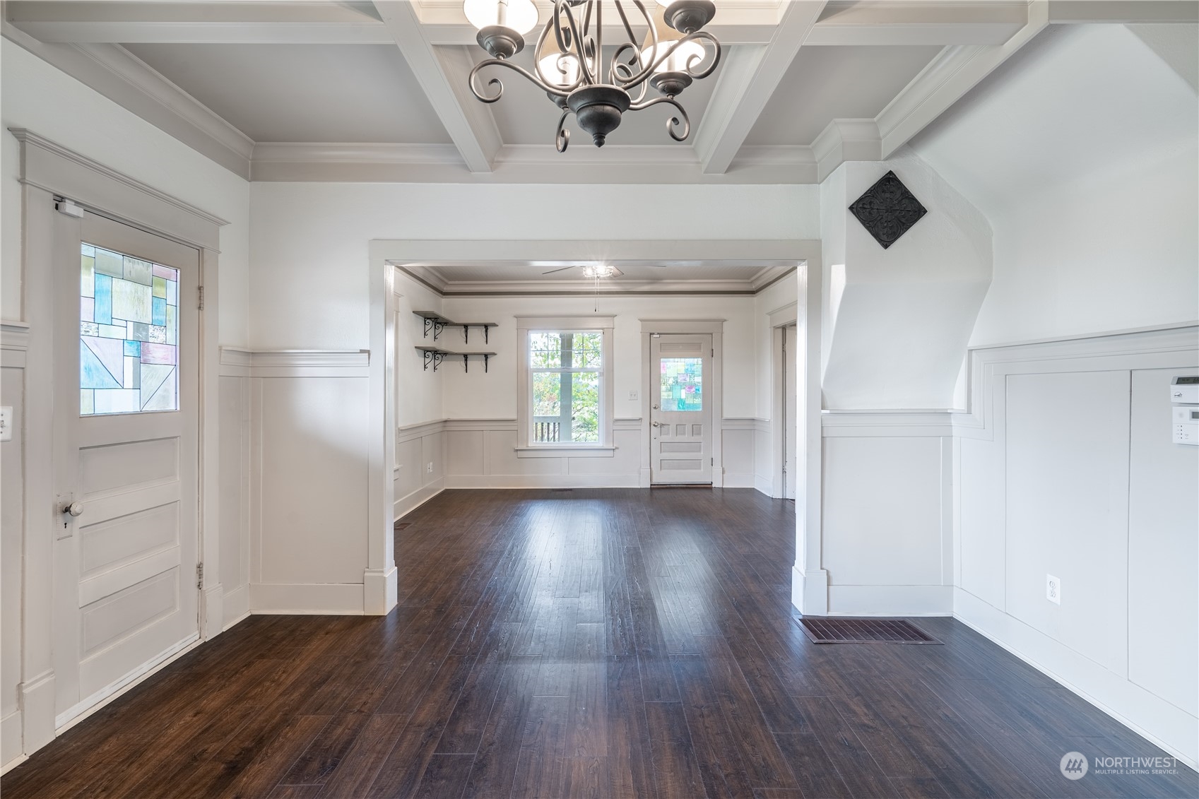 1049 Rush Road Chehalis, WA 98532 - Photo 14 of 40 a view of an empty room with wooden floor and a window