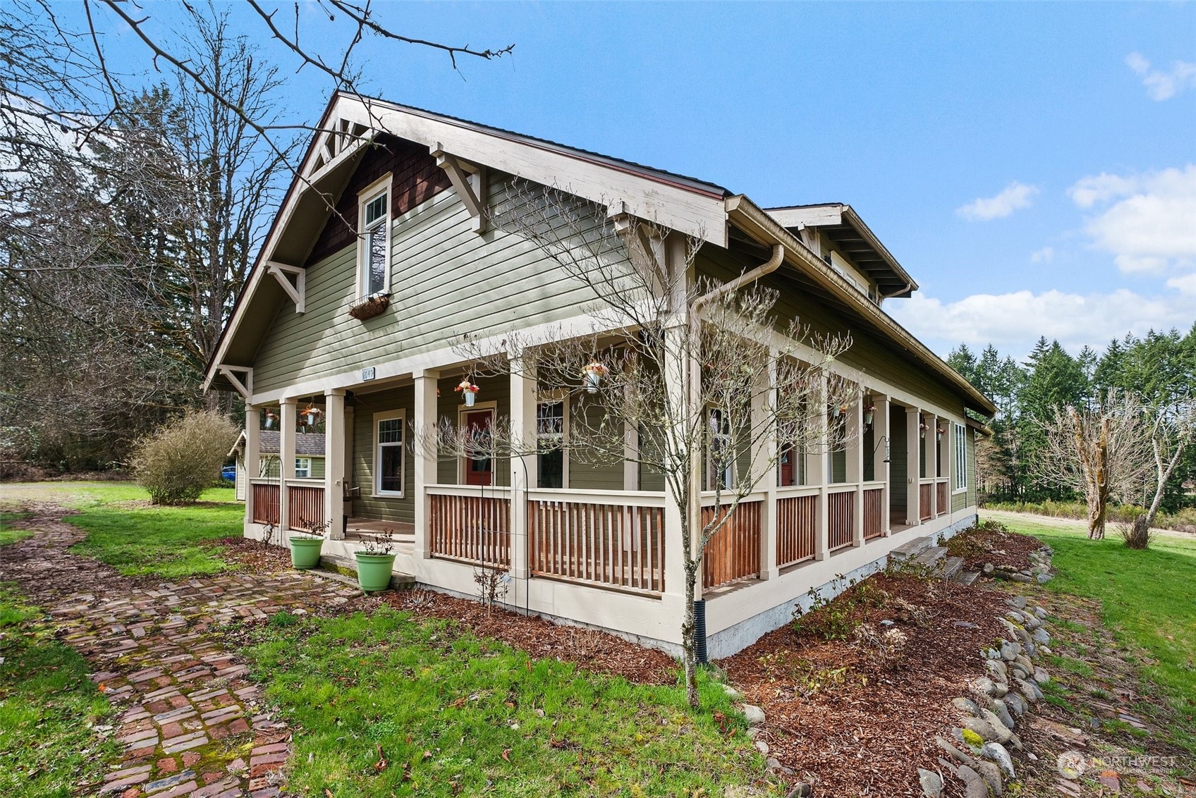1049 Rush Road Chehalis, WA 98532 - Photo 2 of 40 a view of a house with yard and sitting area