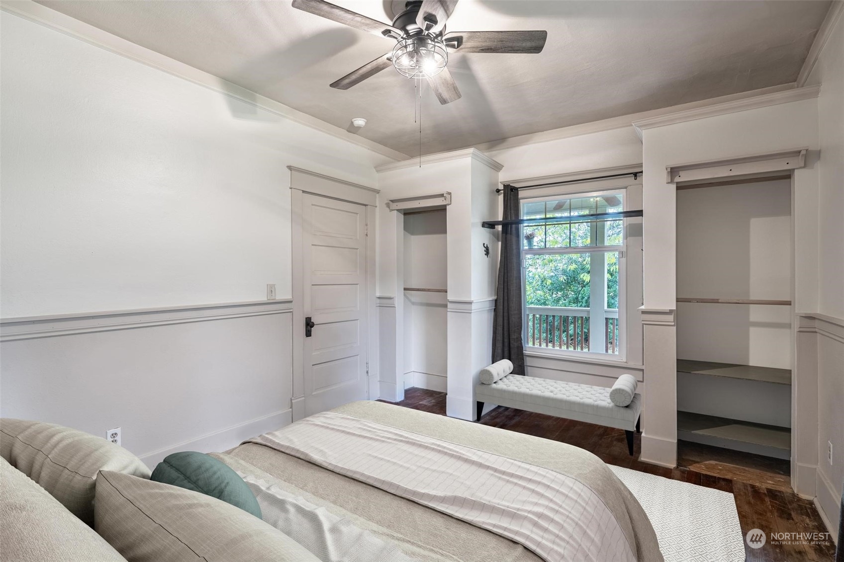 1049 Rush Road Chehalis, WA 98532 - Photo 21 of 40 a bedroom with a large bed and a chandelier