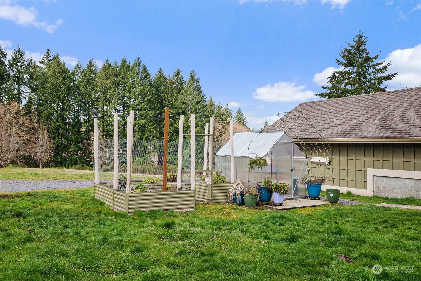 1049 Rush Road Chehalis, WA 98532 - Photo 36 of 40 a front view of a house with garden