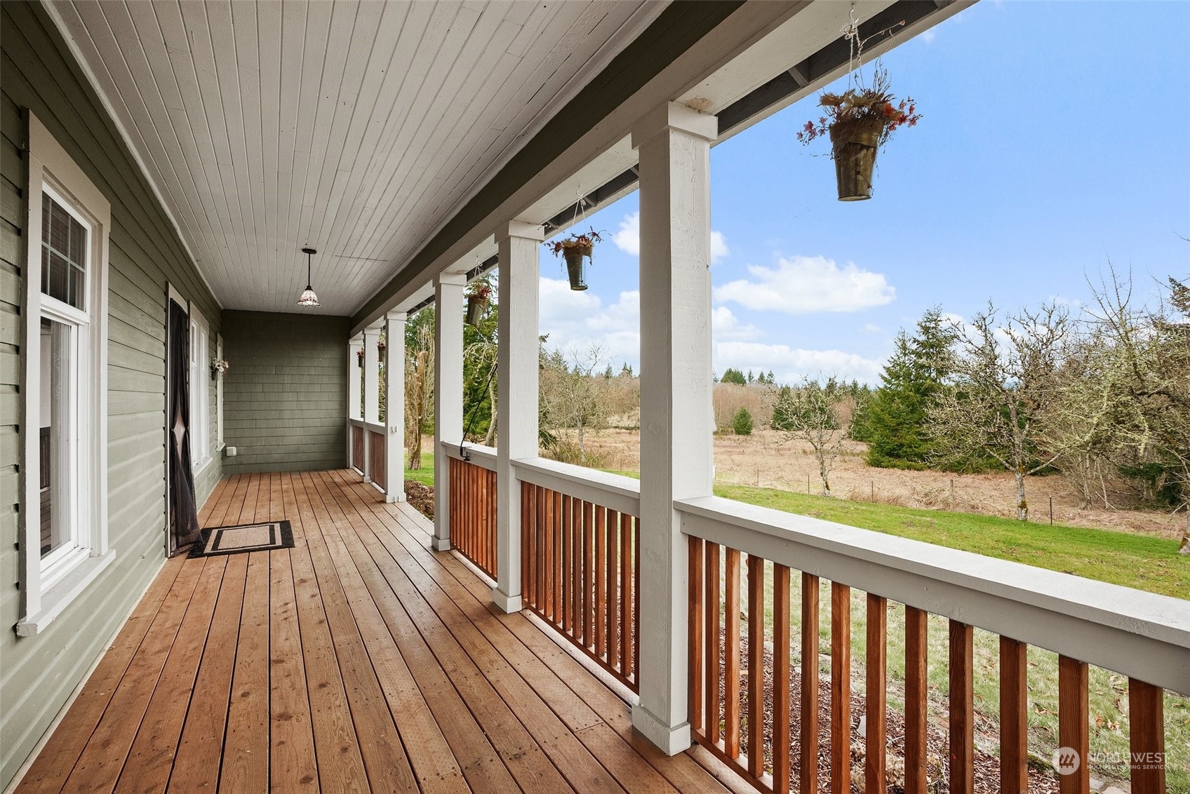 1049 Rush Road Chehalis, WA 98532 - Photo 7 of 40 a view of a balcony with wooden floor