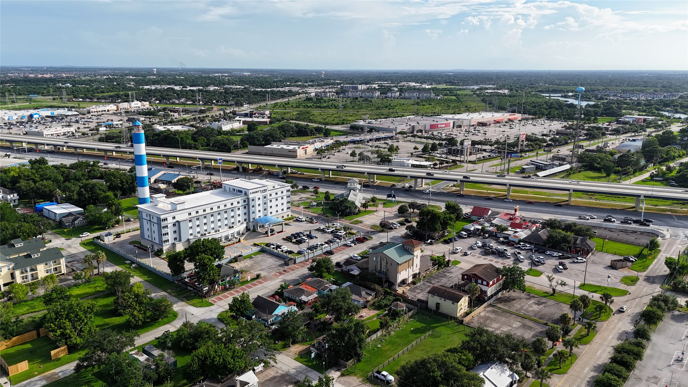507 8th Street Kemah, TX 77565 - Photo 40 of 50 an aerial view of a city with lots of residential buildings