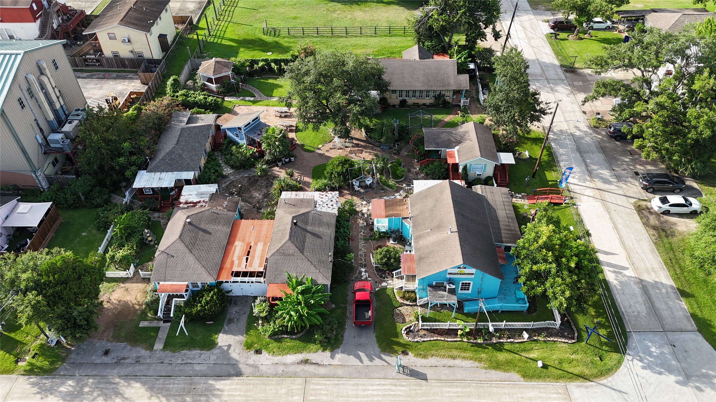 507 8th Street Kemah, TX 77565 - Photo 47 of 50 an aerial view of a house with a yard and lake view