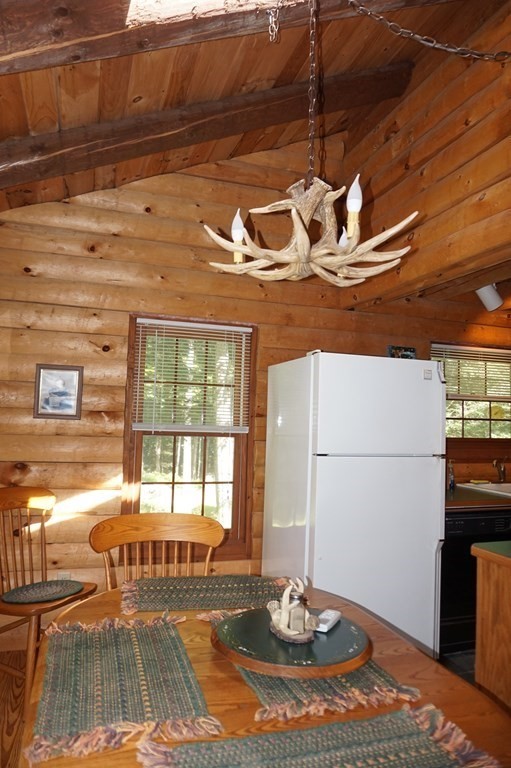 985 Willis Road Phillipston, MA 01331 - Photo 3 of 26 a dining room with a table and chairs