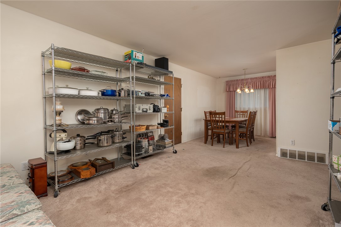 795 Spring Garden Place Dayton, OH 45431 - Photo 17 of 34 This versatile space offers open-concept living, perfect for adaptable functionality and comfortable gatherings.