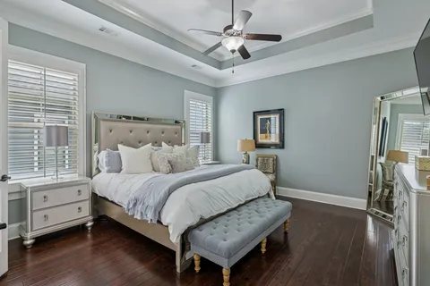 a bathroom with a double vanity sink a mirror and a shower