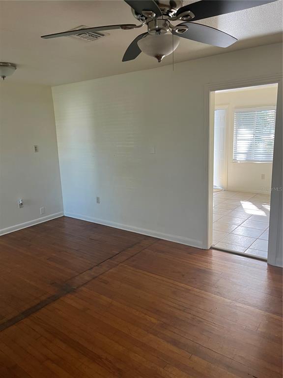 1485 Cleveland Street Clearwater, FL 33755 - Photo 12 of 14 a view of a room with wooden floor
