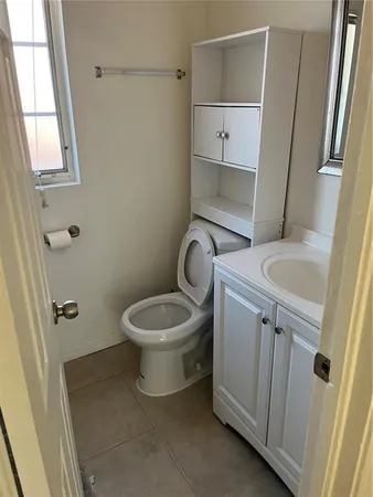 a bathroom with a toilet and a sink