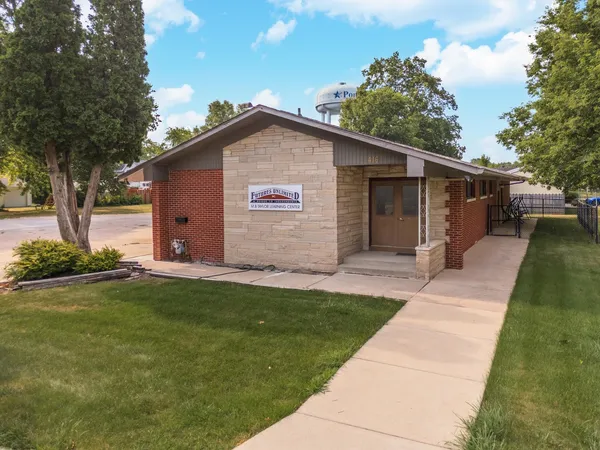 a view of a backyard of the house