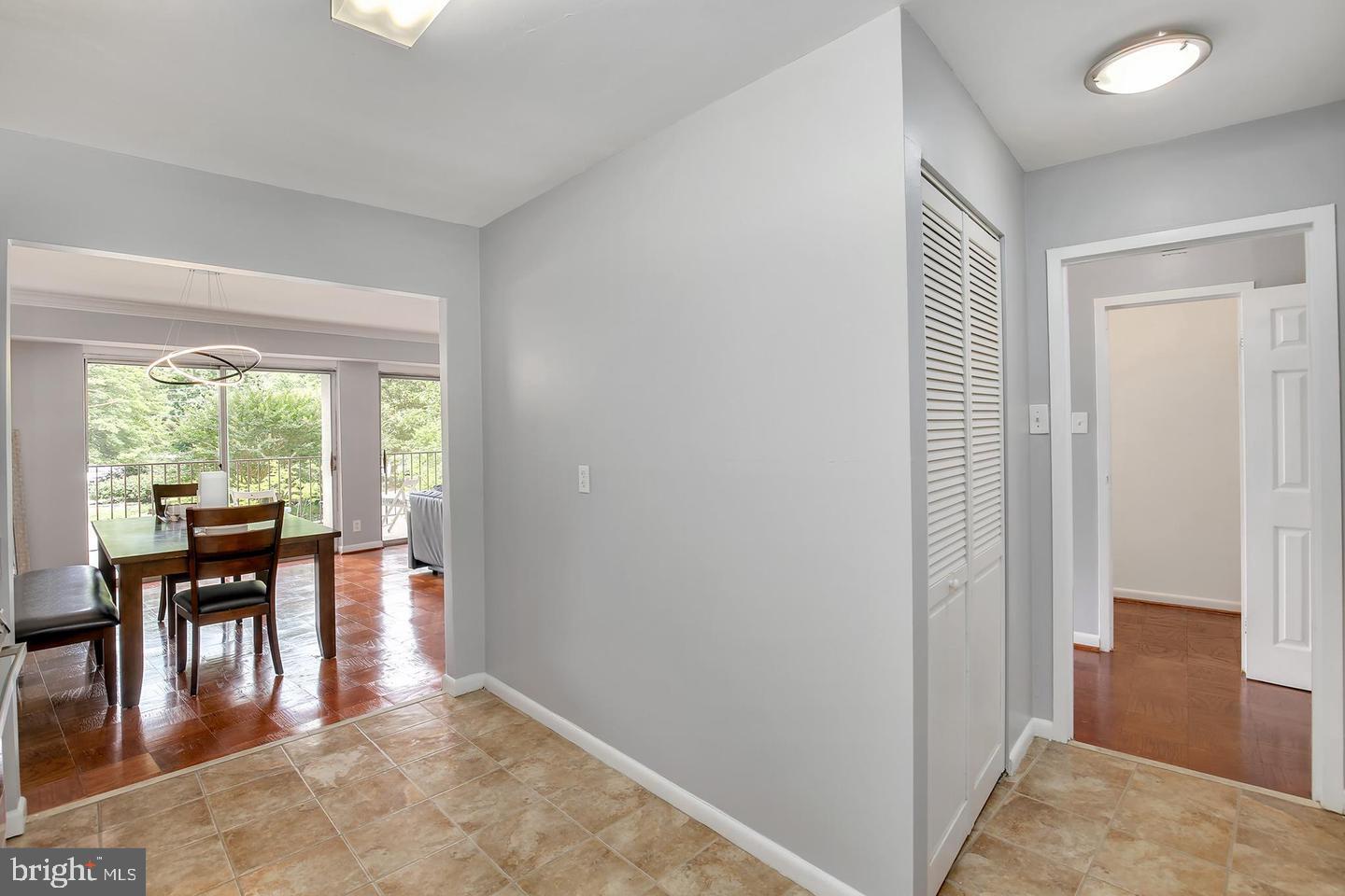 9039 Sligo Creek Parkway, Unit 205 Silver Spring, MD 20901 - Photo 3 of 28 a view of a livingroom with furniture and floor to ceiling window