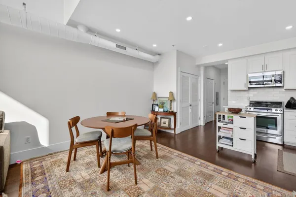 a view of a dining room with furniture
