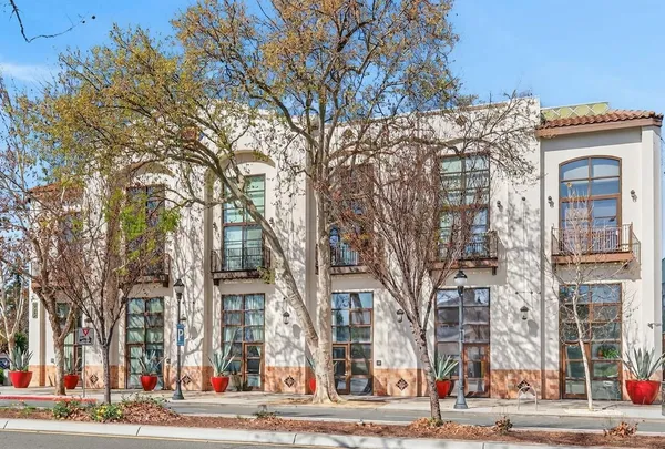 a view of a building and a street