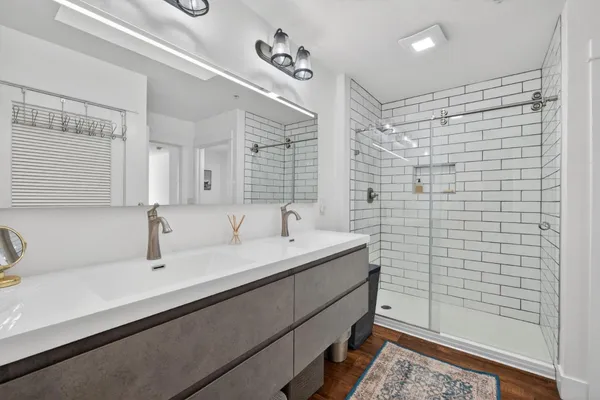 a bathroom with a sink and a mirror