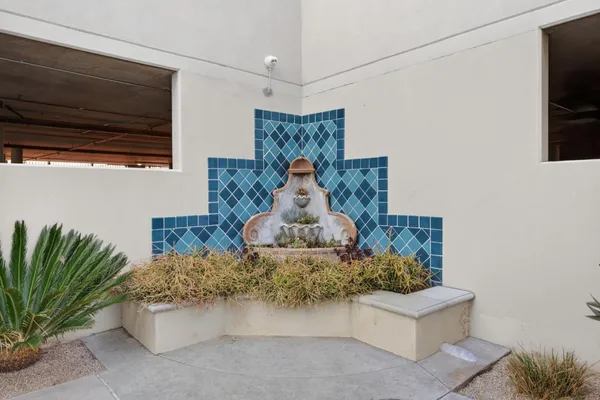 a bed room with a bed and a television