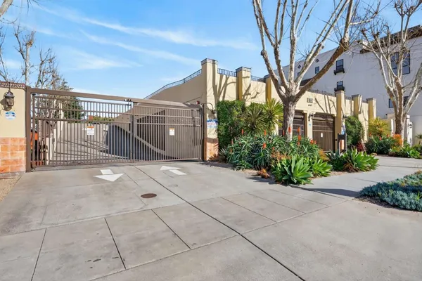 a view of a pathway with a house