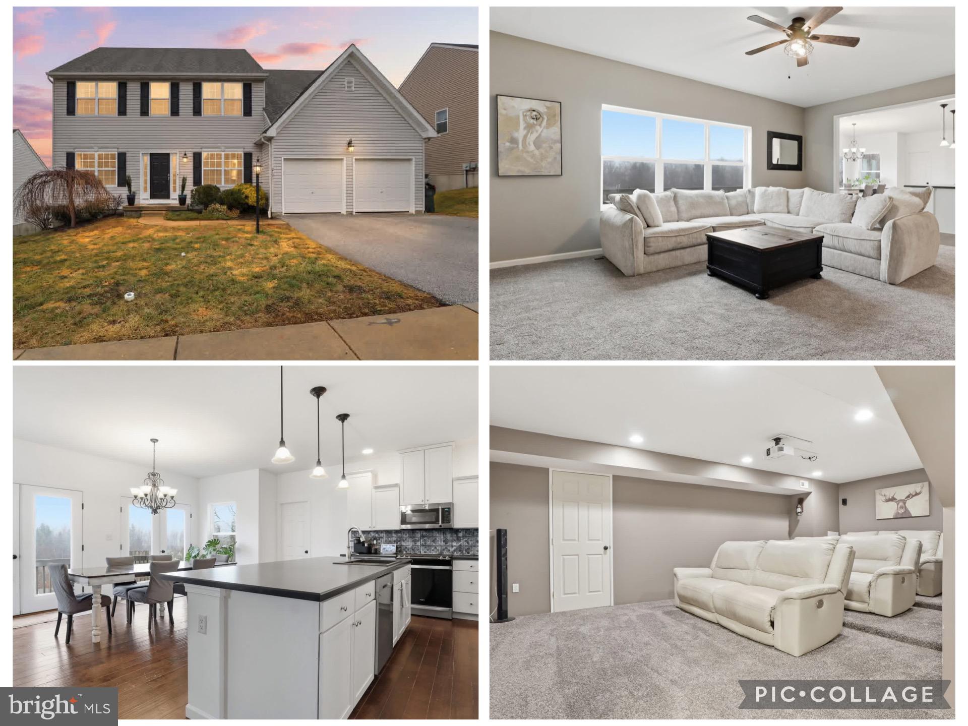 a view of living room kitchen with furniture and fireplace