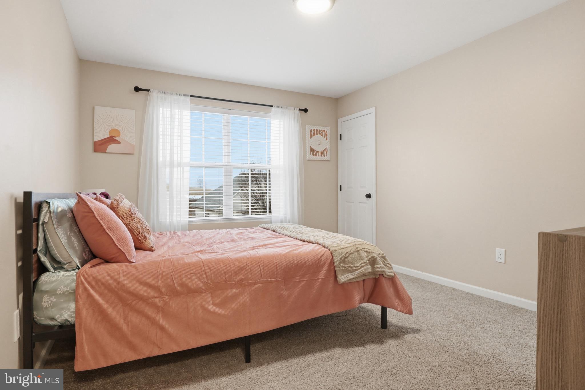 215 Azalea Drive Windsor, PA 17366 - Photo 25 of 68 a bedroom with a bed and window