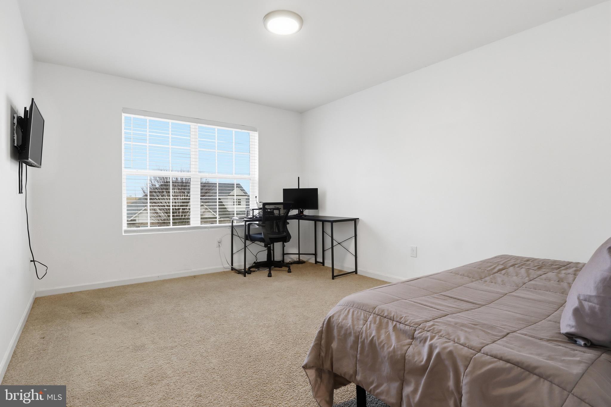 215 Azalea Drive Windsor, PA 17366 - Photo 32 of 68 a bedroom with a bed and a window