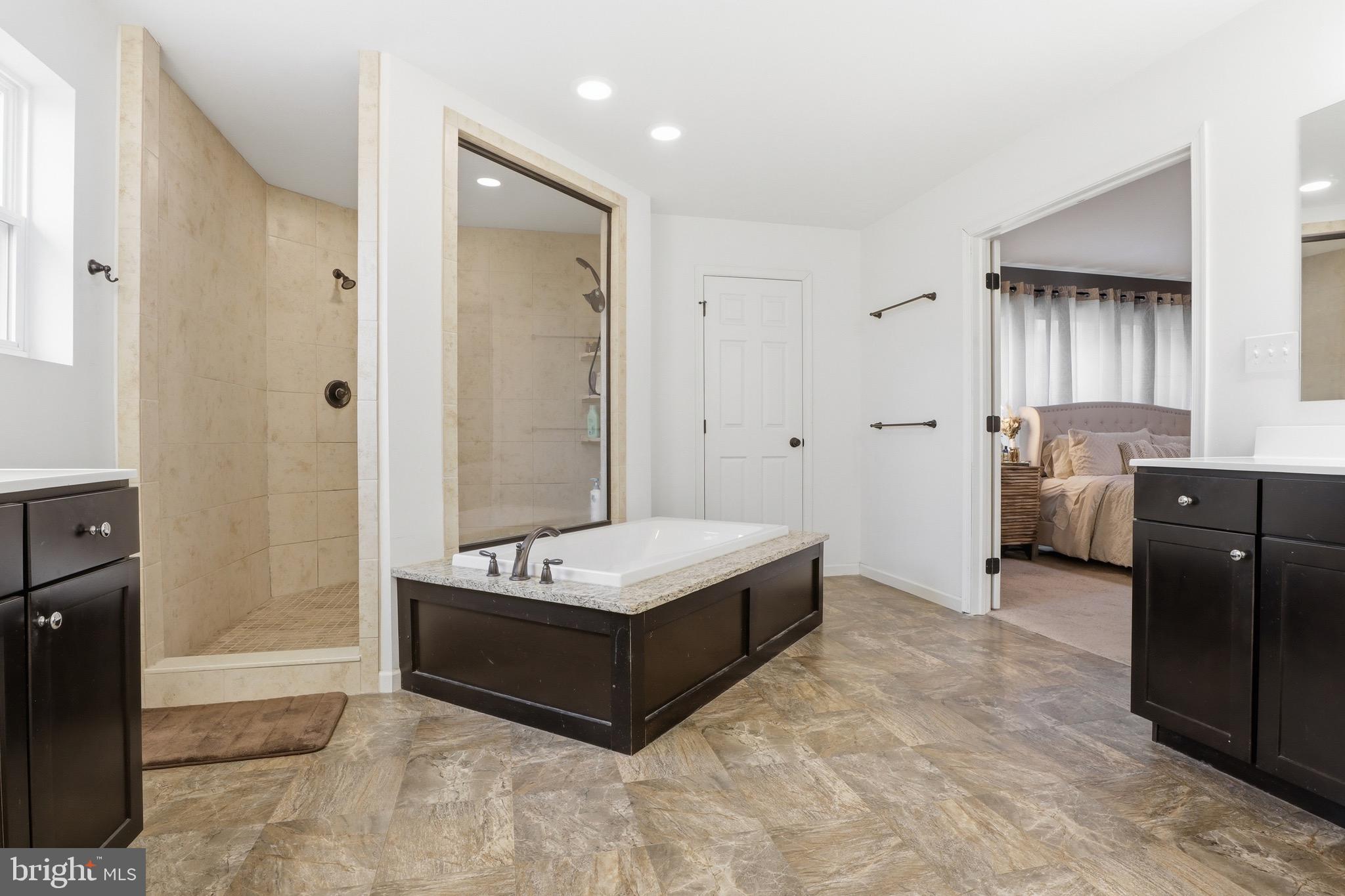 215 Azalea Drive Windsor, PA 17366 - Photo 40 of 68 a spacious bedroom with a bed and a window