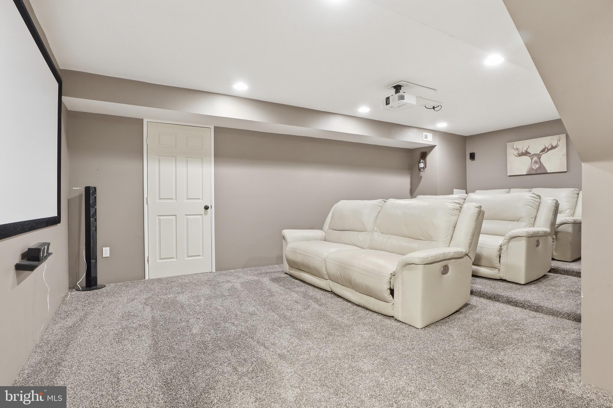 215 Azalea Drive Windsor, PA 17366 - Photo 47 of 68 a living room with furniture and a chandelier