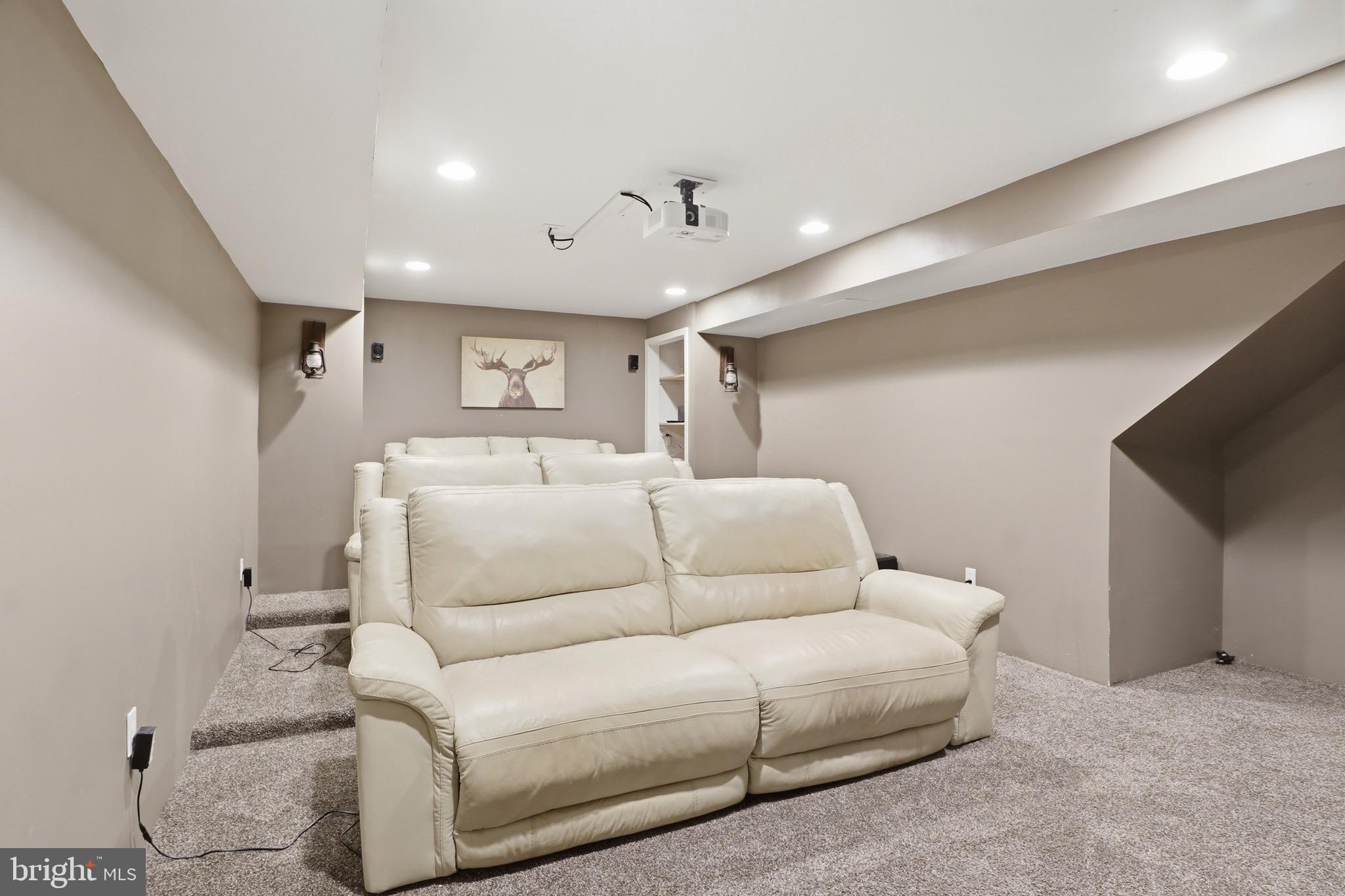 215 Azalea Drive Windsor, PA 17366 - Photo 48 of 68 a living room with furniture a ceiling fan and a rug