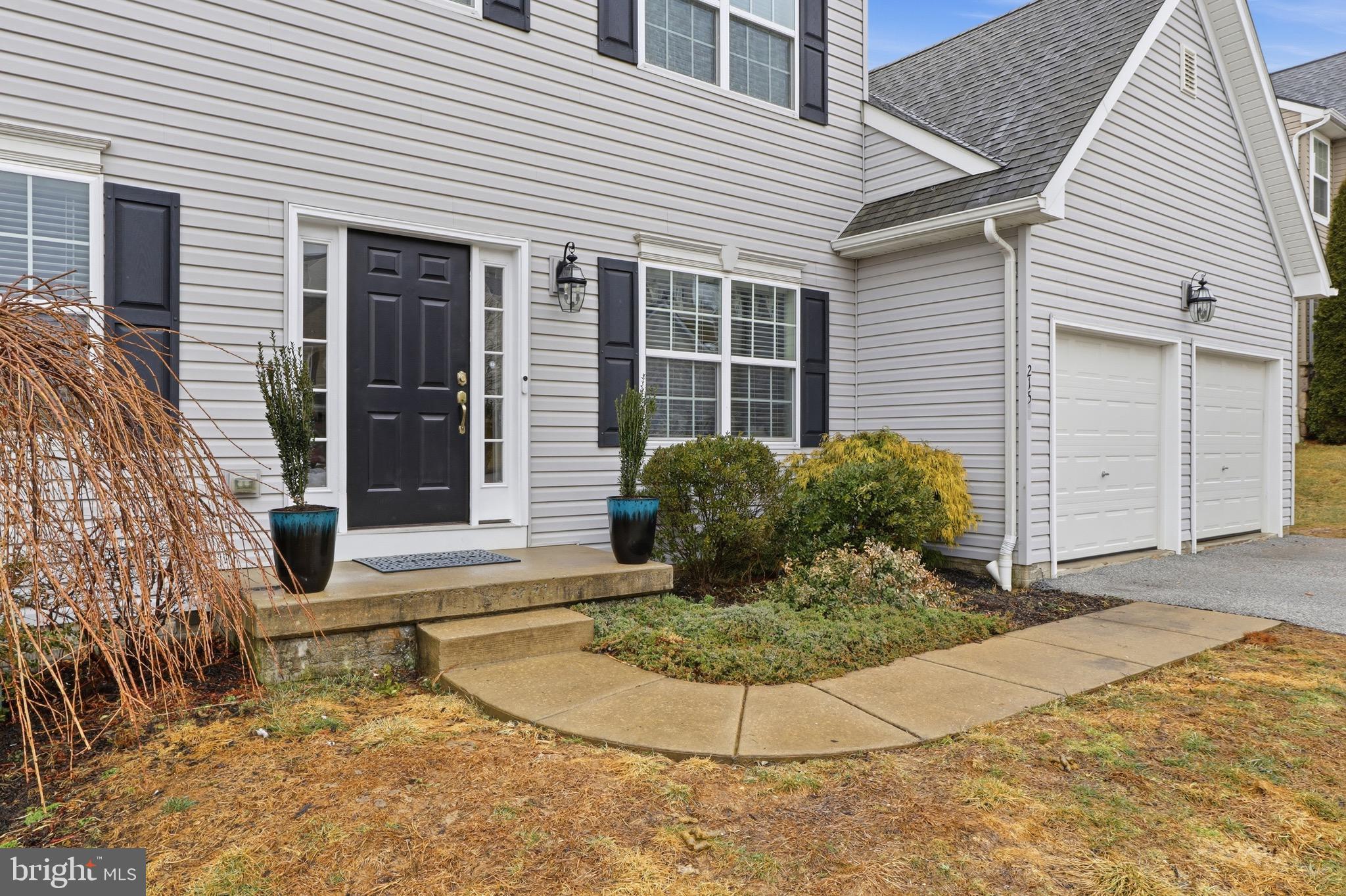 215 Azalea Drive Windsor, PA 17366 - Photo 6 of 68 a view of a house with a small yard and large tree