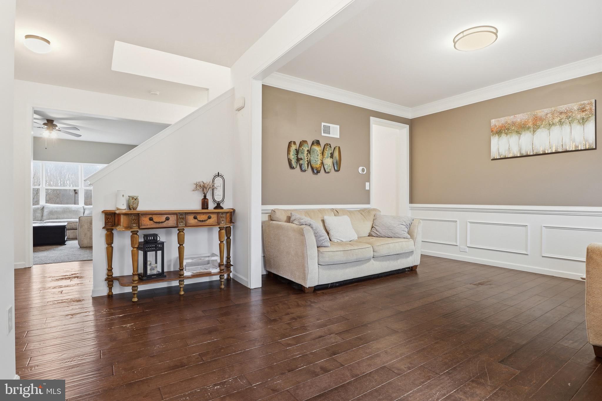 215 Azalea Drive Windsor, PA 17366 - Photo 7 of 68 a living room with furniture and wooden floor