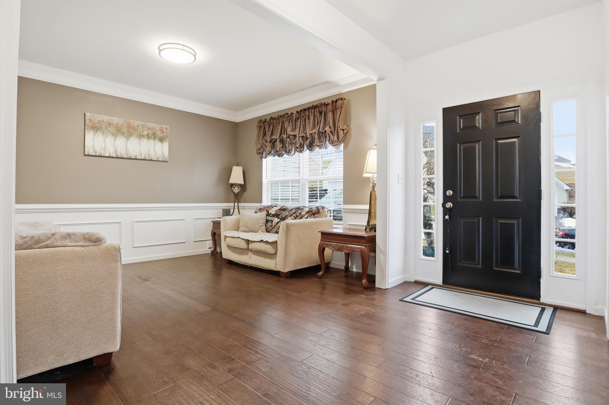 215 Azalea Drive Windsor, PA 17366 - Photo 8 of 68 a living room with furniture and a large window