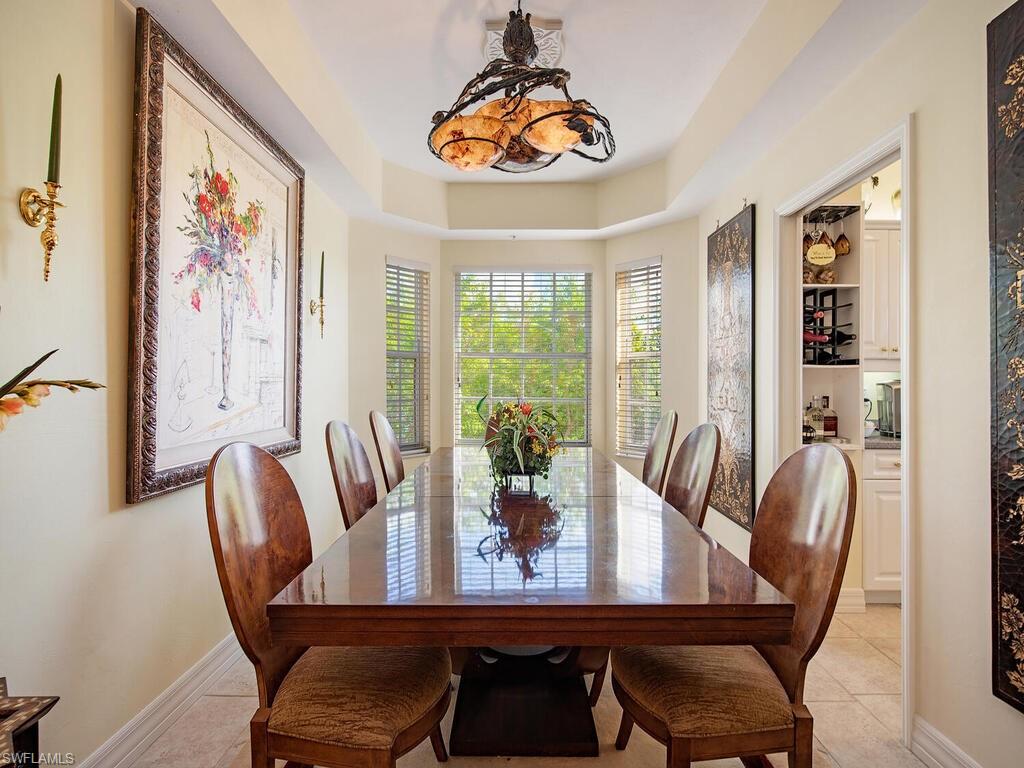 451 Bayfront Place, Unit 5311 Naples, FL 34102 - Photo 3 of 22 a view of a dining room with furniture window and outside view