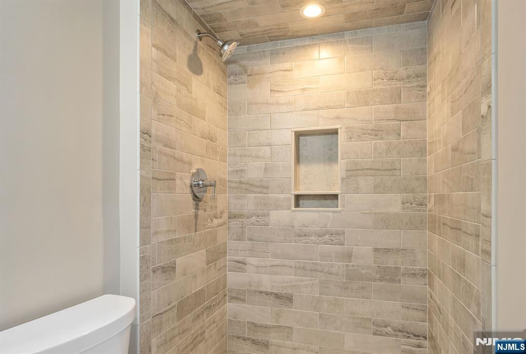 415 Goffle Road Wyckoff, NJ 07481 - Photo 25 of 30 a bathroom with a shower