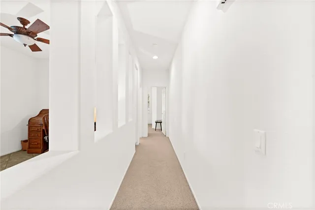 a bathroom with a sink a toilet and shower curtain