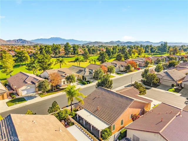 a view of residential houses with outdoor space
