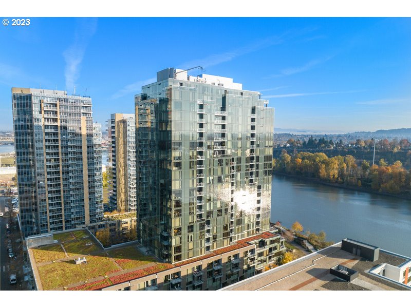 841 Southwest Gaines Street, Unit 343 Portland, OR 97239 - Photo 1 of 32 a view of a city with tall buildings