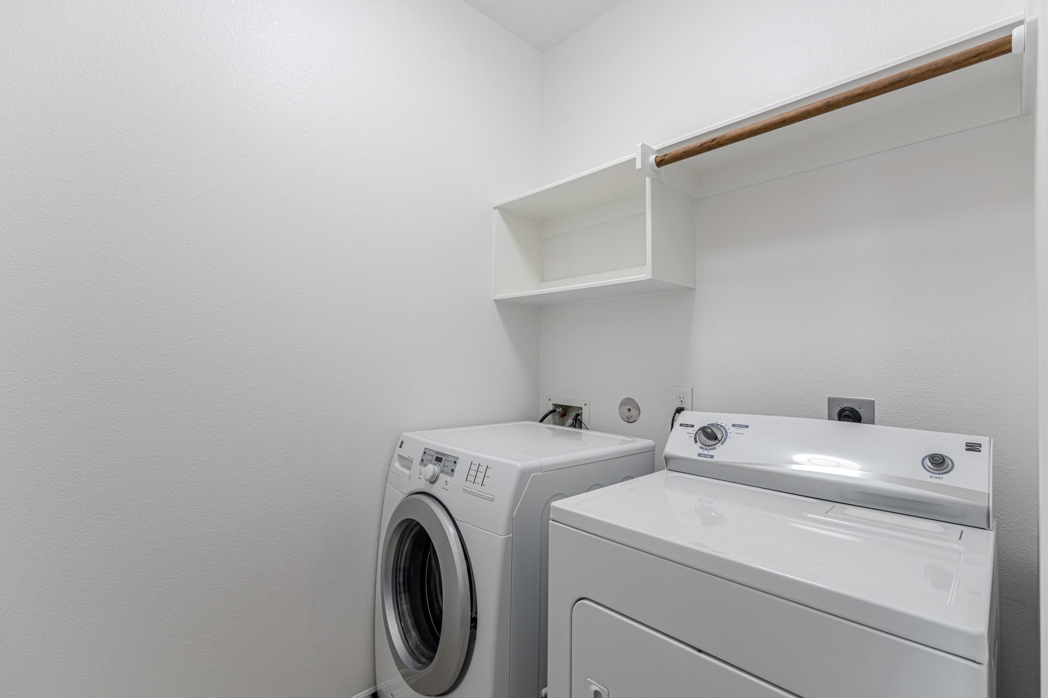 58 Aventura Place Spring, TX 77389 - Photo 17 of 23 a utility room with dryer and washer