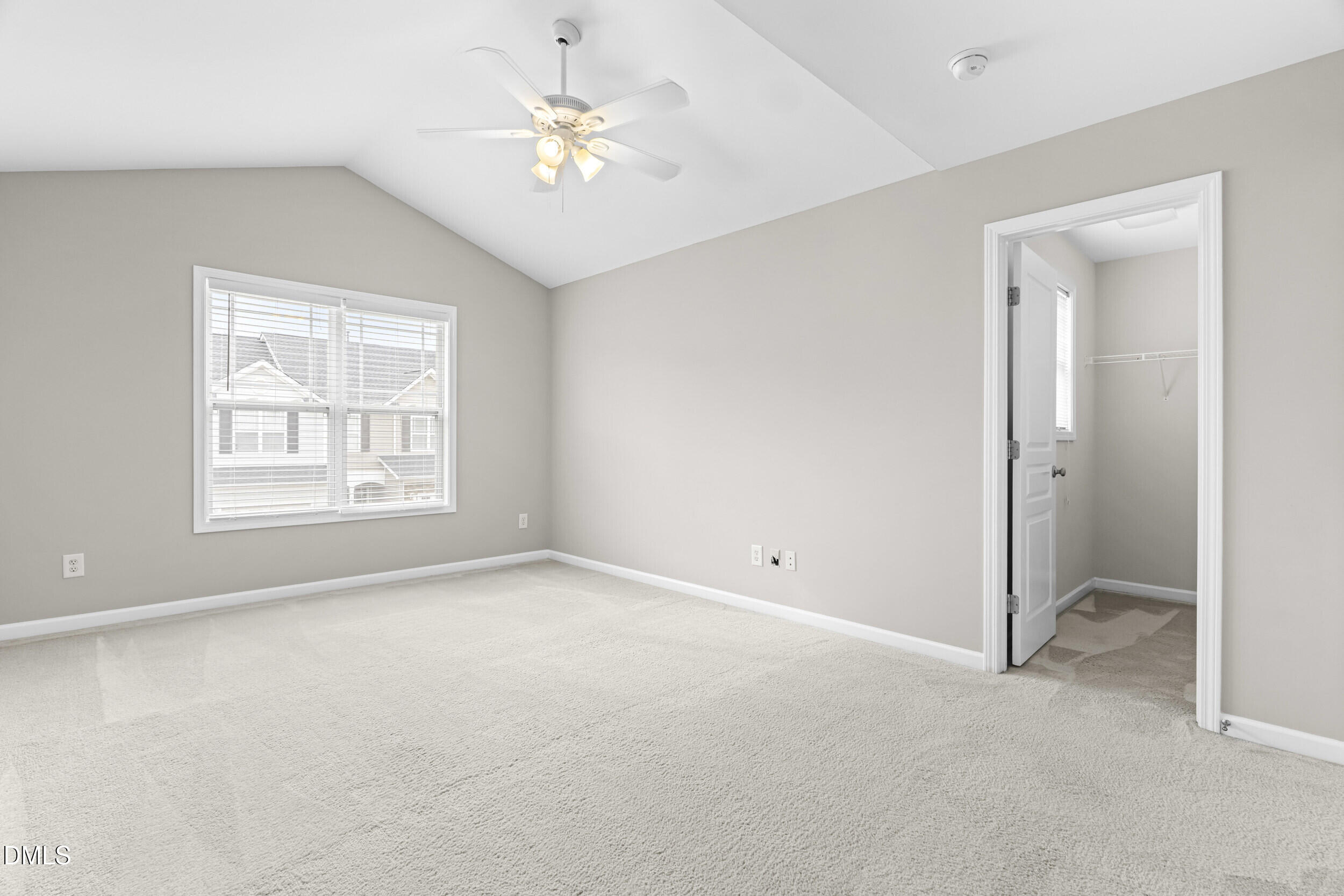 2636 Asher View Court Raleigh, NC 27606 - Photo 15 of 35 an empty room with windows and fan