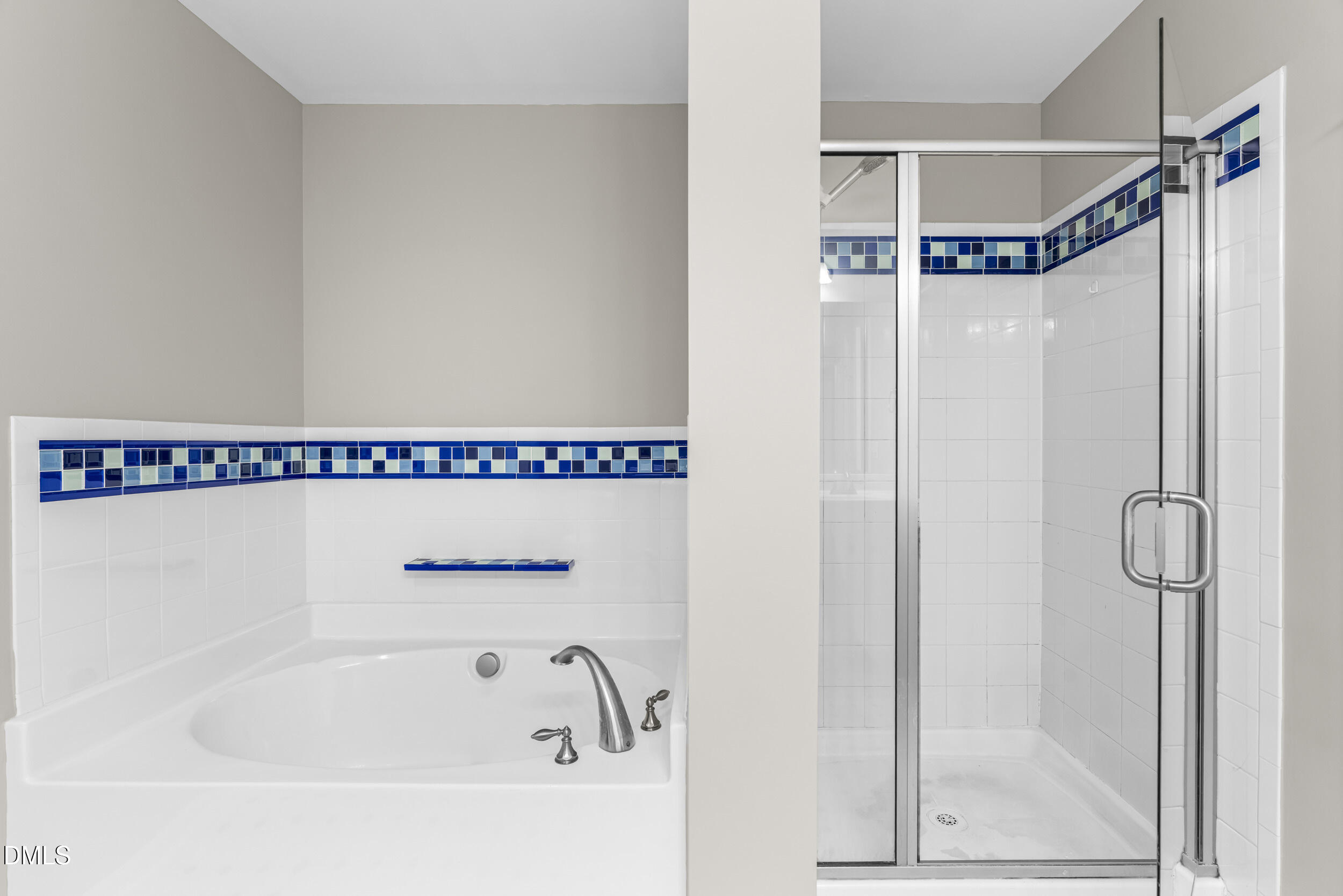 2636 Asher View Court Raleigh, NC 27606 - Photo 17 of 35 a bathroom with a bathtub and a shower