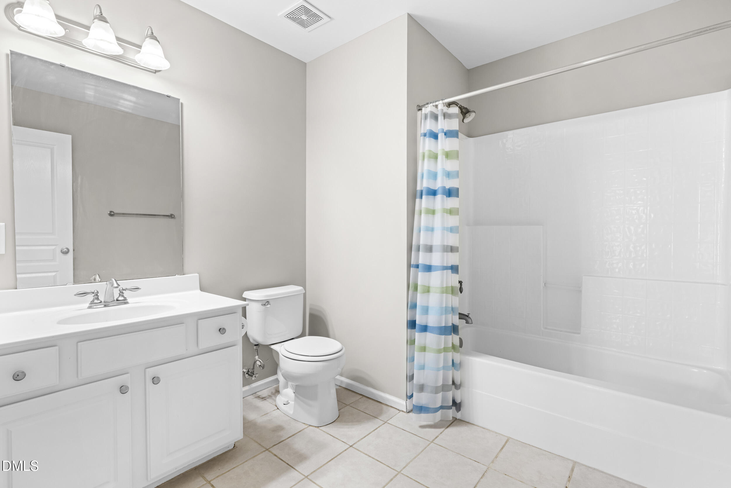 2636 Asher View Court Raleigh, NC 27606 - Photo 20 of 35 a bathroom with a sink a toilet and shower
