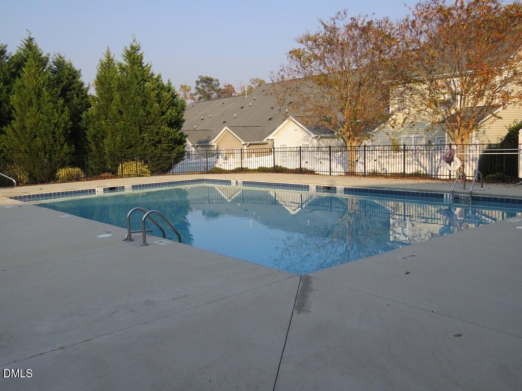2636 Asher View Court Raleigh, NC 27606 - Photo 28 of 35 a view of a swimming pool with an outdoor space