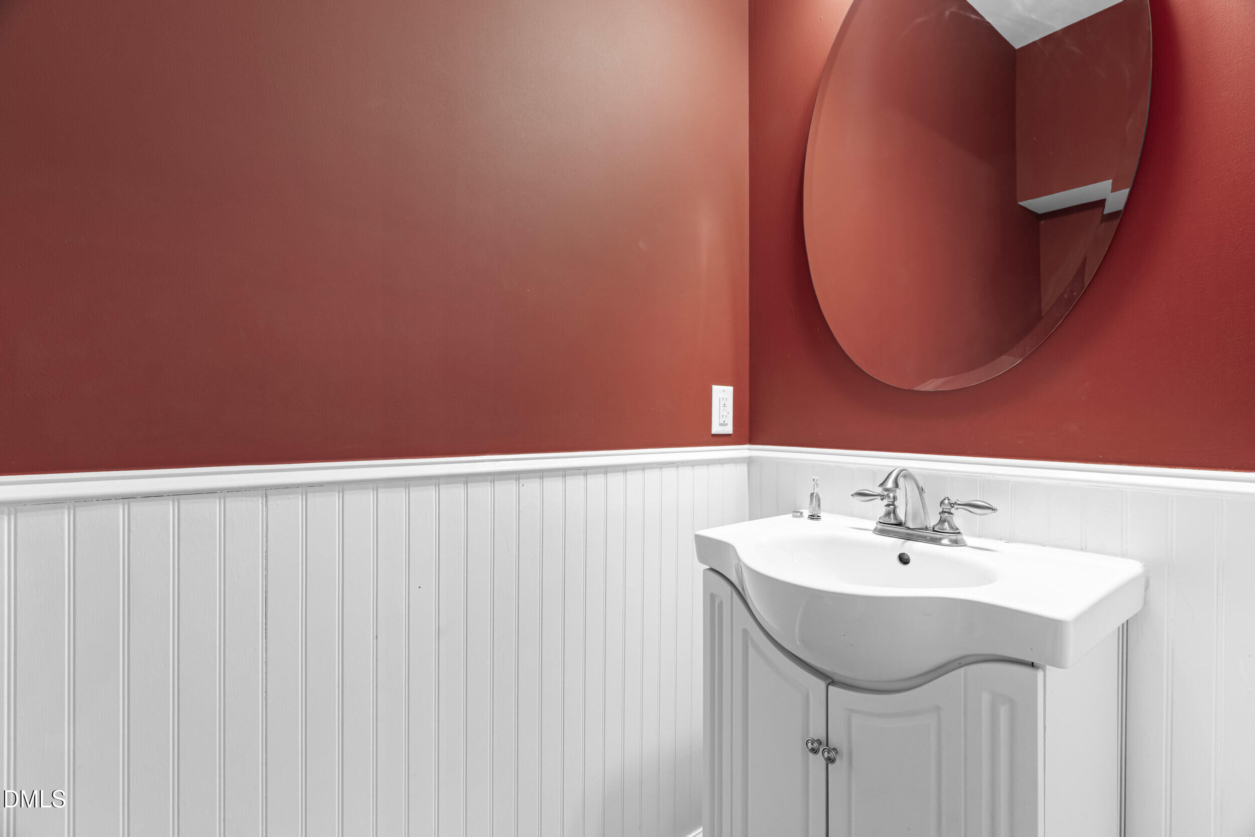 2636 Asher View Court Raleigh, NC 27606 - Photo 10 of 35 a bathroom with a sink and a mirror