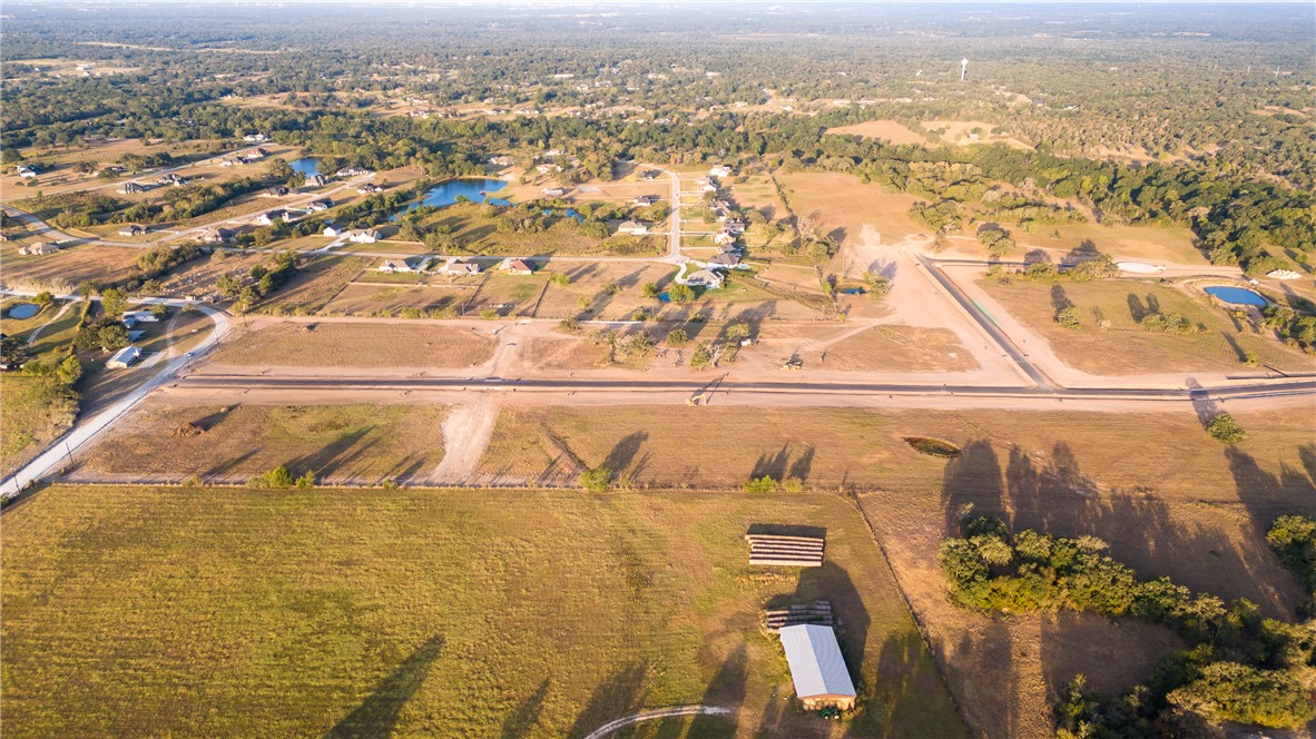 9942 Panther Creek Road Iola, TX 77861 - Photo 16 of 50 an aerial view of residential houses with outdoor space