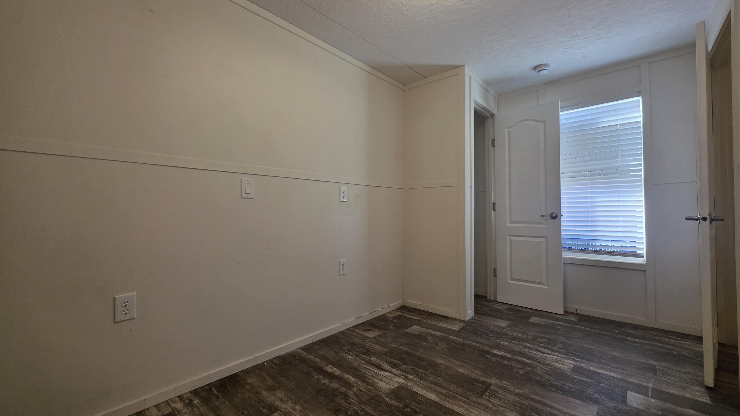 6801 19th Street, Unit 179 Lubbock, TX 79407 - Photo 14 of 15 a view of a room that has a window in it